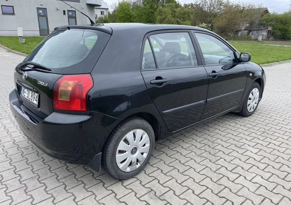 Toyota Corolla cena 7900 przebieg: 205133, rok produkcji 2003 z Warszawa małe 92